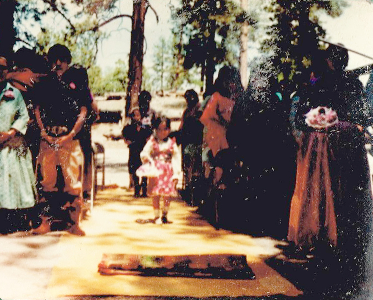 My father and mothers traditional ceremony. At age 5, I was the flower girl