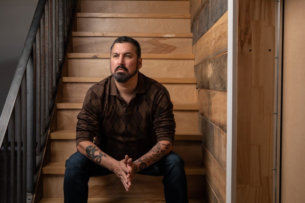 Image of Mike Bern sitting on steps